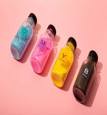 still-life-cmyk-toners-composition_23-2149120722